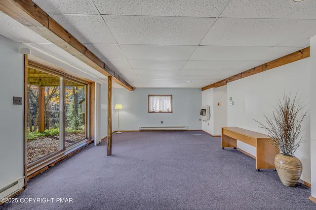 a view of swimming pool with an outdoor seating