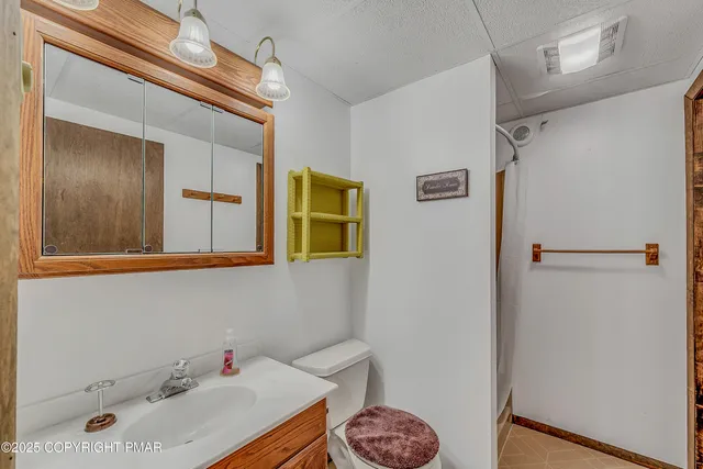 a view of a swimming pool with a lake view