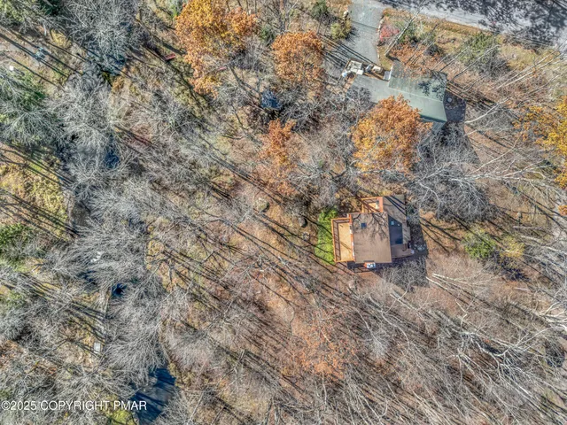 a view of a chairs and table in the balcony