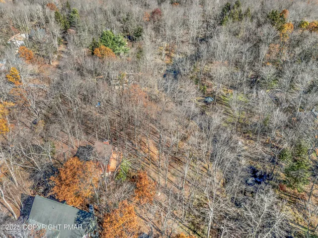 a outdoor living space with fireplace furniture and a flat screen tv