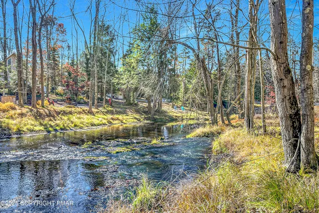 a view of balcony with wooden floor