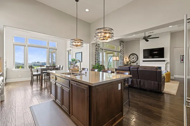 a view of a dining room with furniture and windows