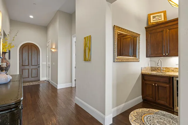 a bathroom with a sink double vanity and a mirror