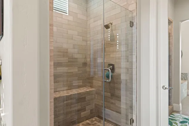 a front view of a house with a yard table and chairs