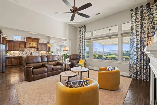 a kitchen with stainless steel appliances granite countertop a stove and a refrigerator
