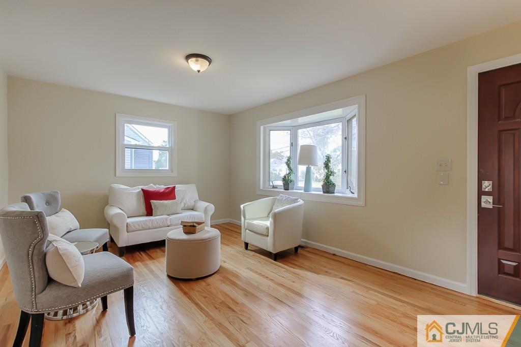 31 Longfield Road New Brunswick, NJ 08901 - Photo 6 of 15 a living room with furniture and a window