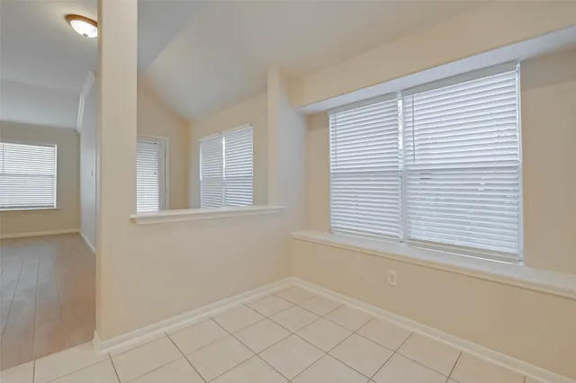 a view of an empty room with window