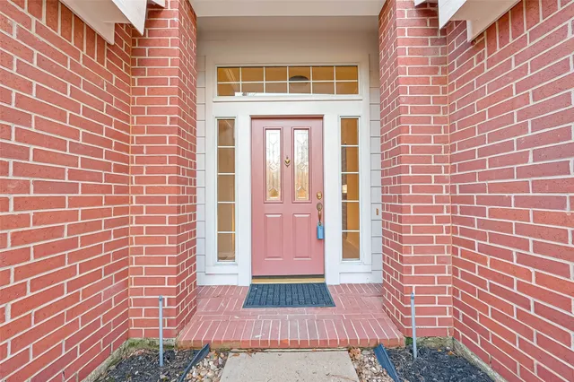 a view of a brick building with many windows