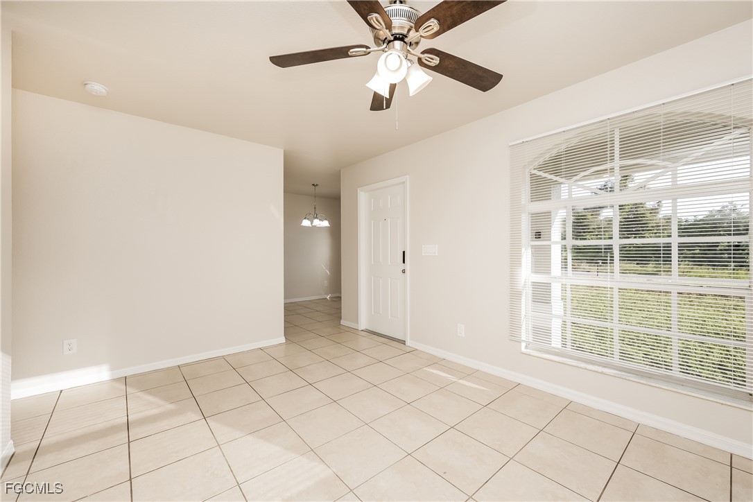 3704 6th Street Southwest Lehigh Acres, FL 33976 - Photo 4 of 16 a view of an empty room