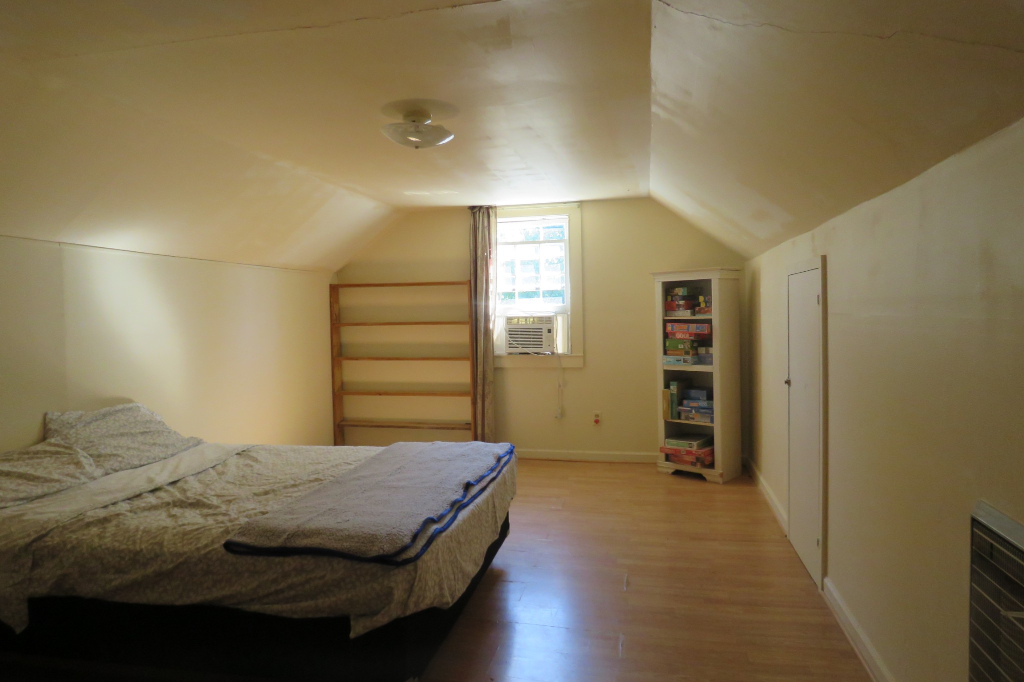 169 Dyer Ridge Road Baxter, TN 38544 - Photo 12 of 25 a bedroom with a bed and a walk in closet