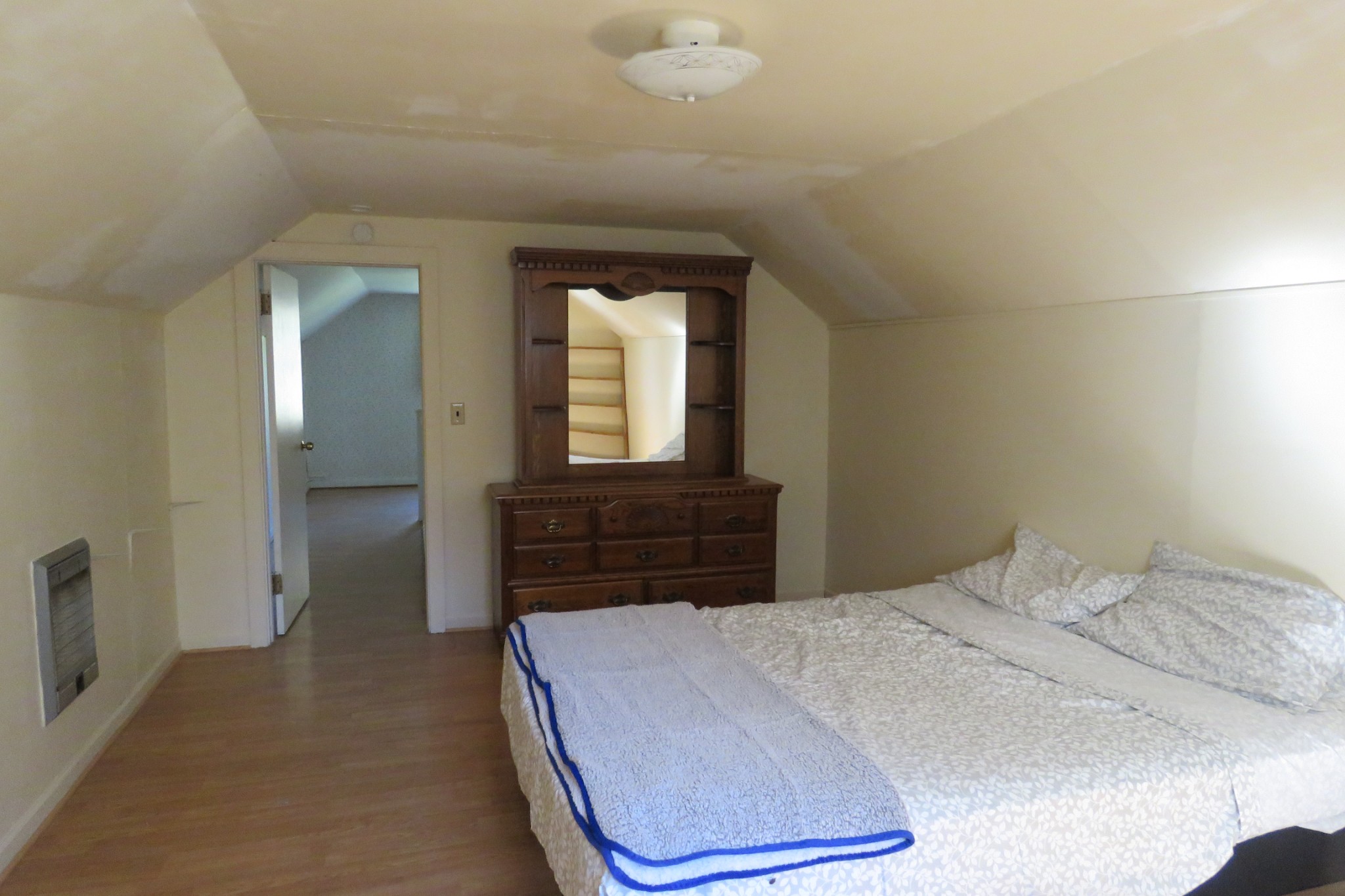 169 Dyer Ridge Road Baxter, TN 38544 - Photo 13 of 25 a bedroom with a bed and a dresser