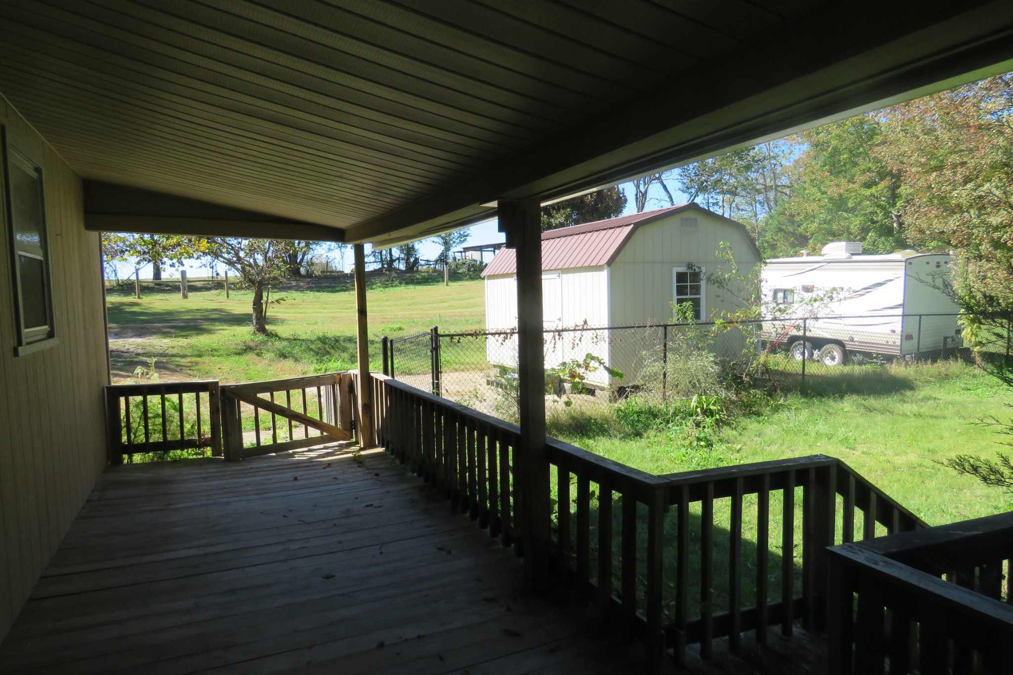169 Dyer Ridge Road Baxter, TN 38544 - Photo 15 of 25 a view of a porch with wooden floor and outdoor space
