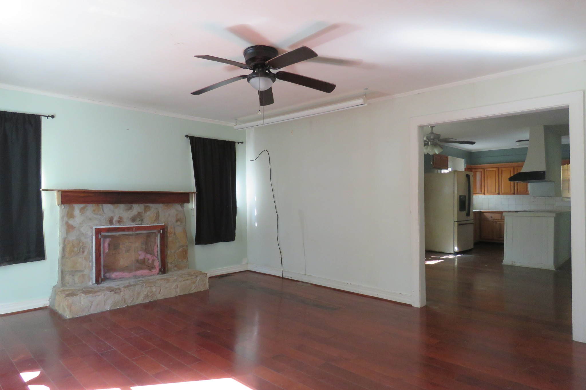 169 Dyer Ridge Road Baxter, TN 38544 - Photo 2 of 25 a view of an empty room with a fireplace and a window