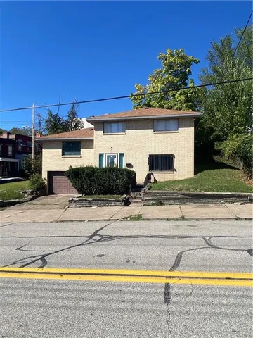 a view of a house with a swimming pool