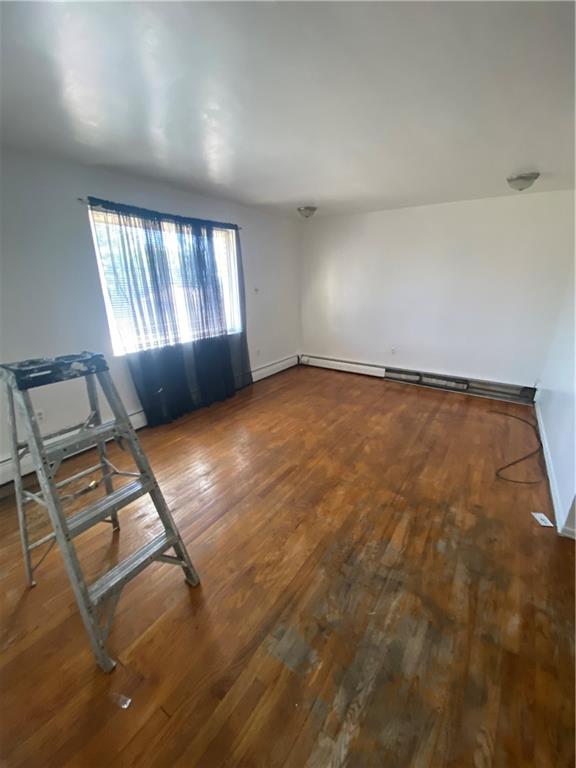 2525 Webster Avenue Pittsburgh, PA 15219 - Photo 4 of 11 an empty room with windows