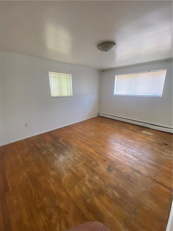 2525 Webster Avenue Pittsburgh, PA 15219 - Photo 10 of 11 an empty room with a empty space and windows