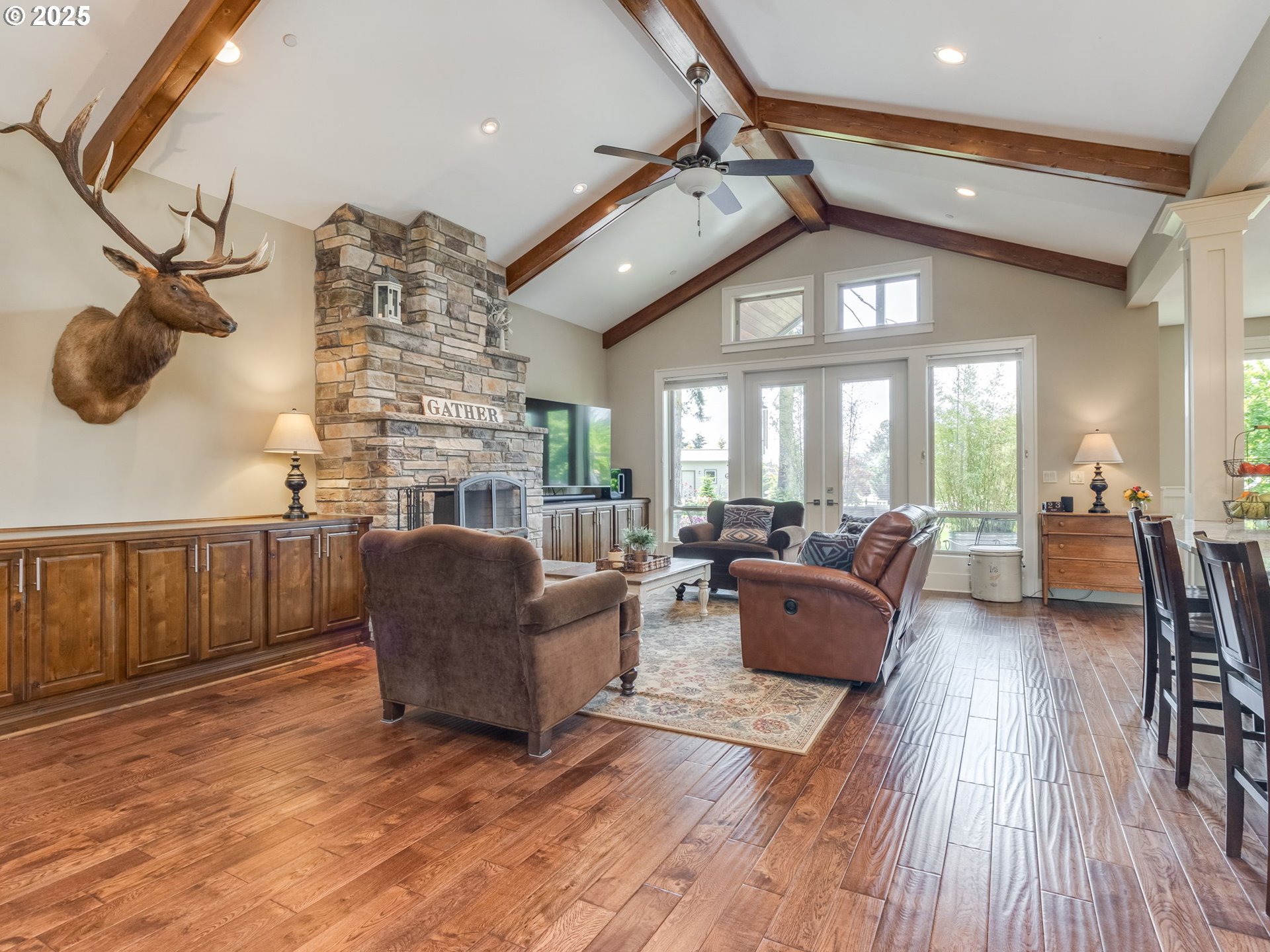 20321 Olmstead Road Northeast Aurora, OR 97002 - Photo 14 of 45 a living room with furniture and a wooden floor