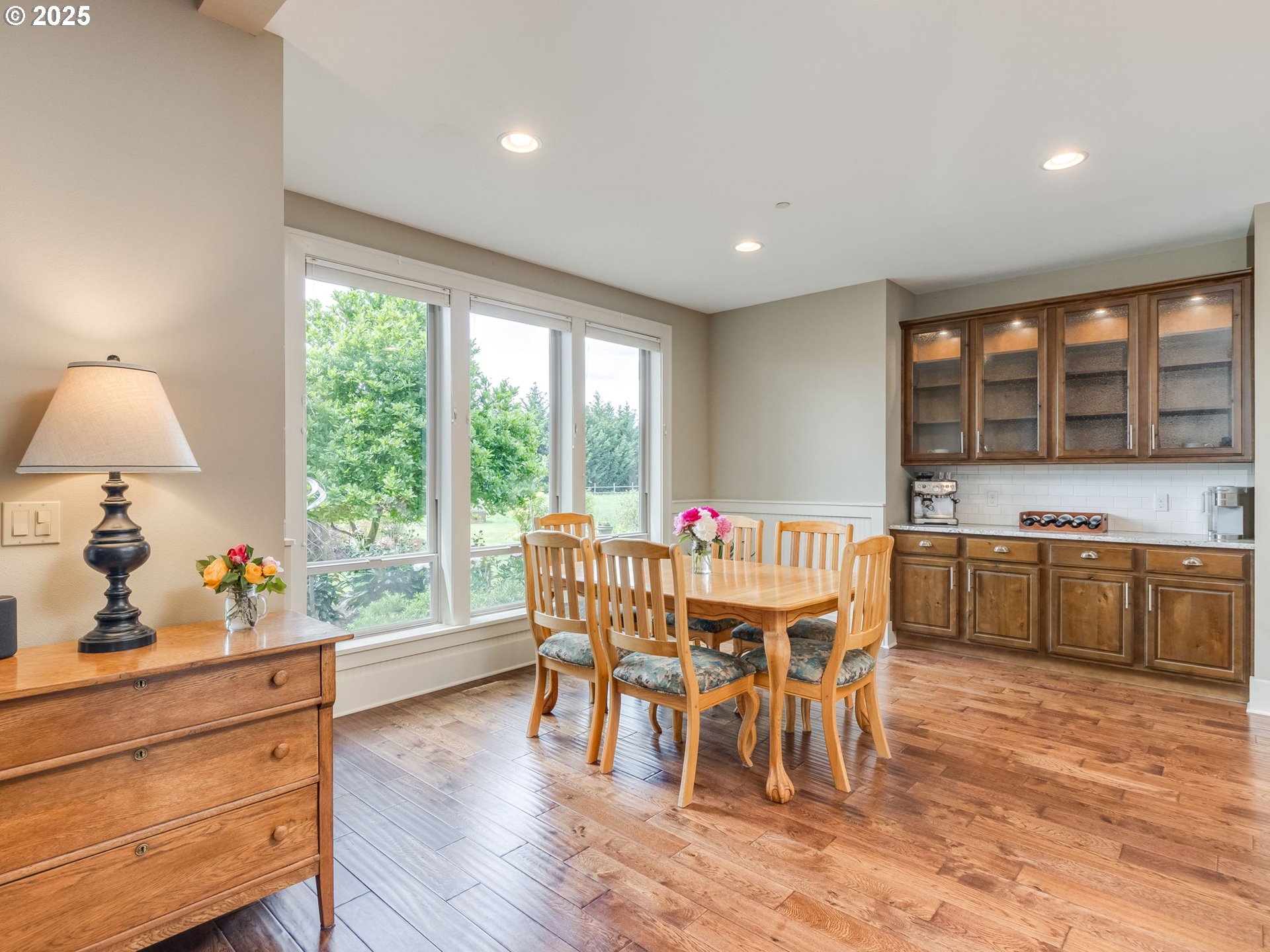 20321 Olmstead Road Northeast Aurora, OR 97002 - Photo 18 of 45 a dining room with furniture window and wooden floor