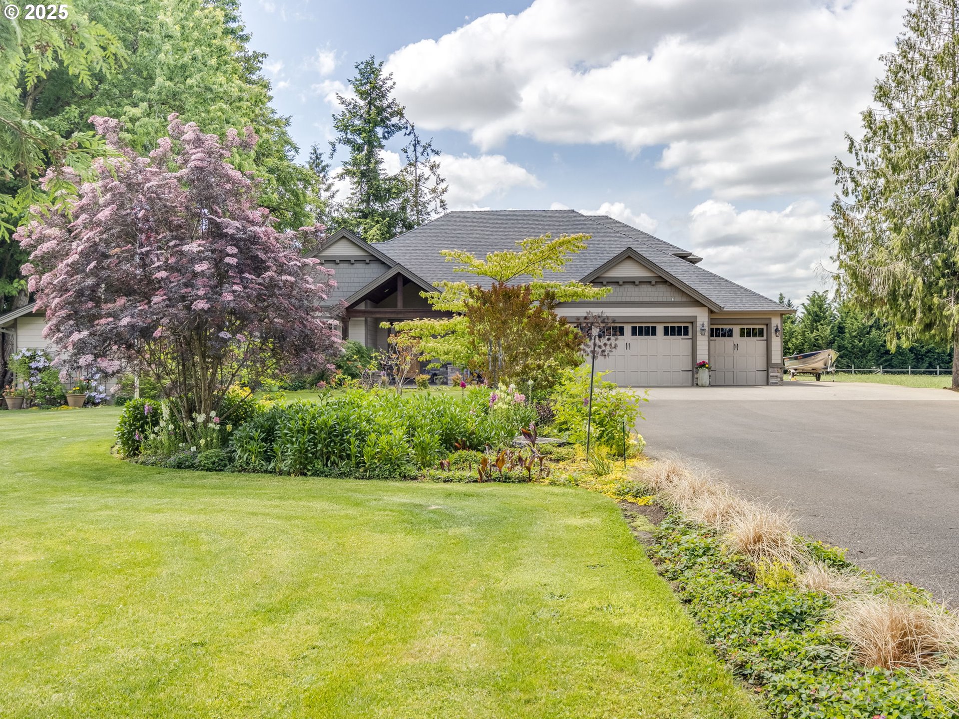 20321 Olmstead Road Northeast Aurora, OR 97002 - Photo 3 of 45 a front view of a house with a yard