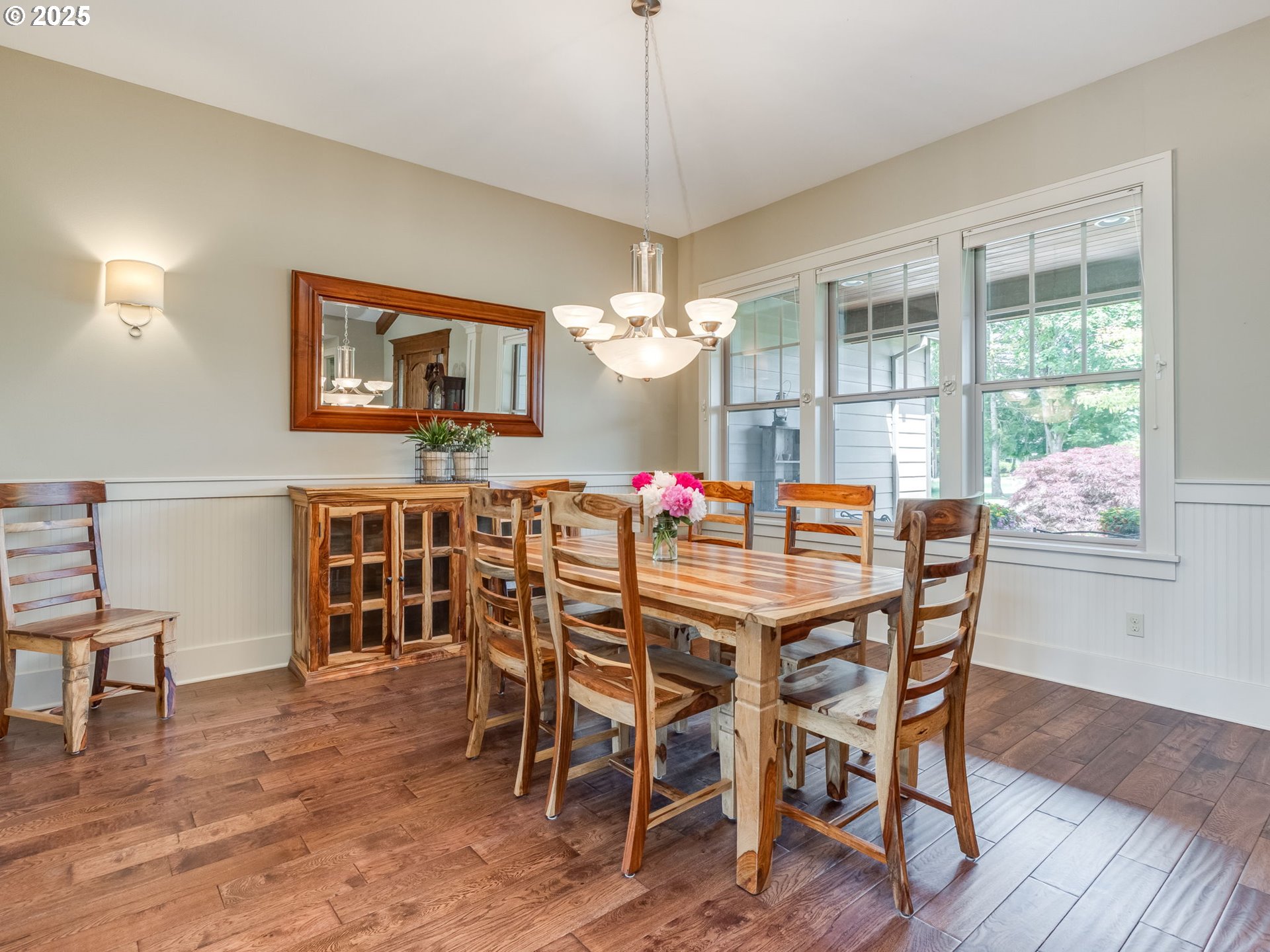 20321 Olmstead Road Northeast Aurora, OR 97002 - Photo 10 of 45 a dining room with furniture a chandelier and wooden floor