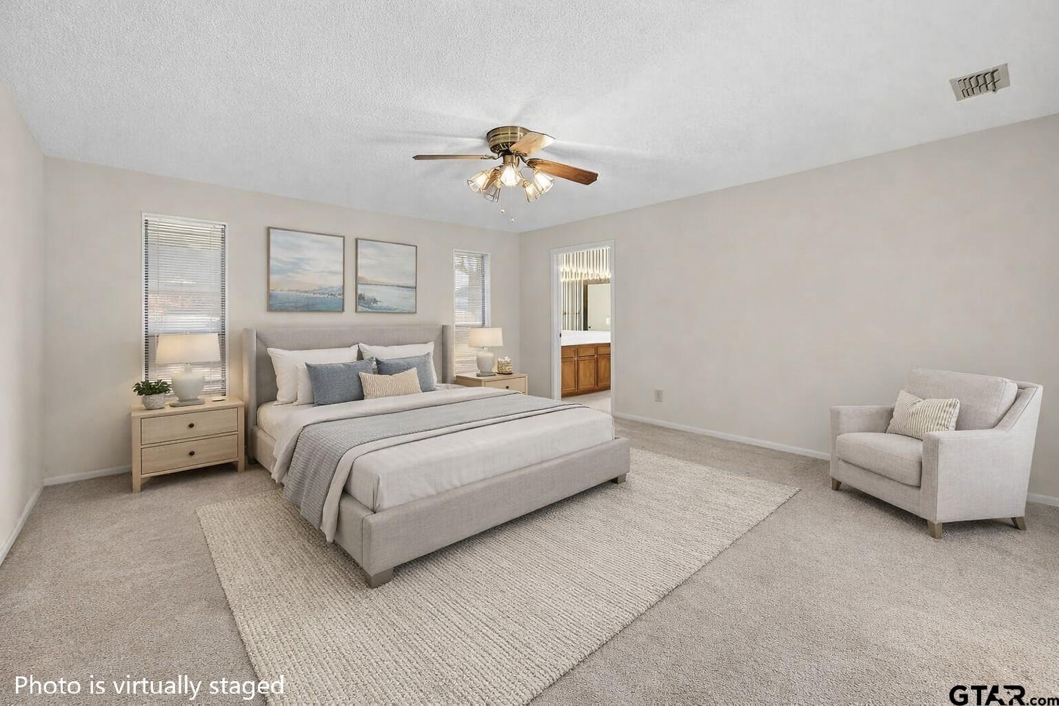 1111 Hillside Drive Athens, TX 75751 - Photo 12 of 20 a bedroom with a bed and furniture