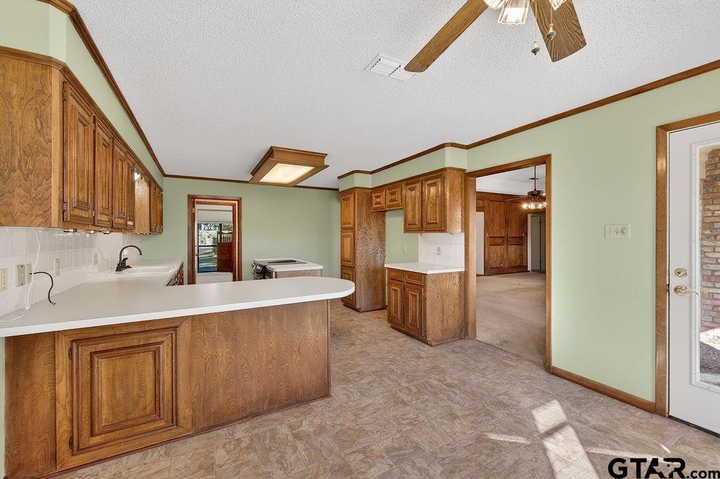 1111 Hillside Drive Athens, TX 75751 - Photo 9 of 20 a large kitchen with a sink