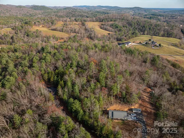 an aerial view of residential house with parking space