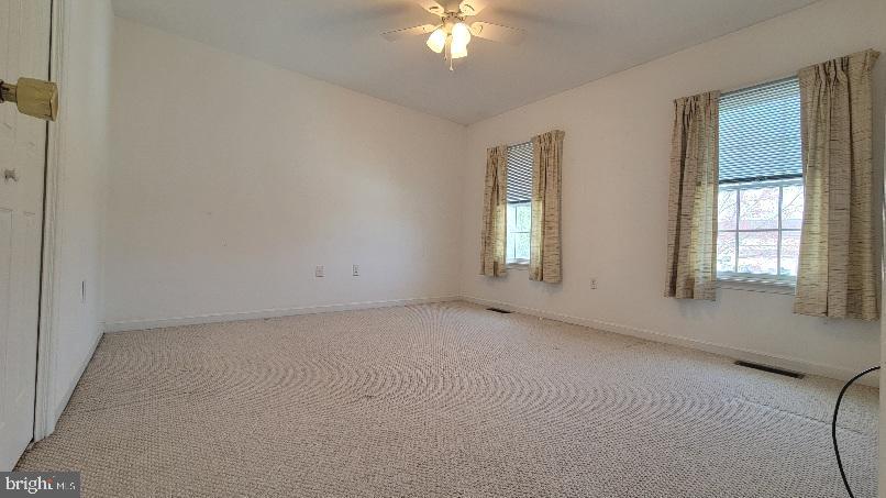 337 East Ridge Drive Hagerstown, MD 21740 - Photo 11 of 17 a view of an empty room with a window