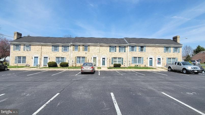 337 East Ridge Drive Hagerstown, MD 21740 - Photo 17 of 17 a view of a building with a car parked in front of it