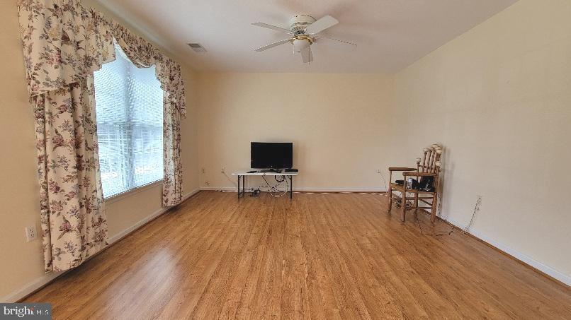 337 East Ridge Drive Hagerstown, MD 21740 - Photo 2 of 17 a living room with furniture and a flat screen tv