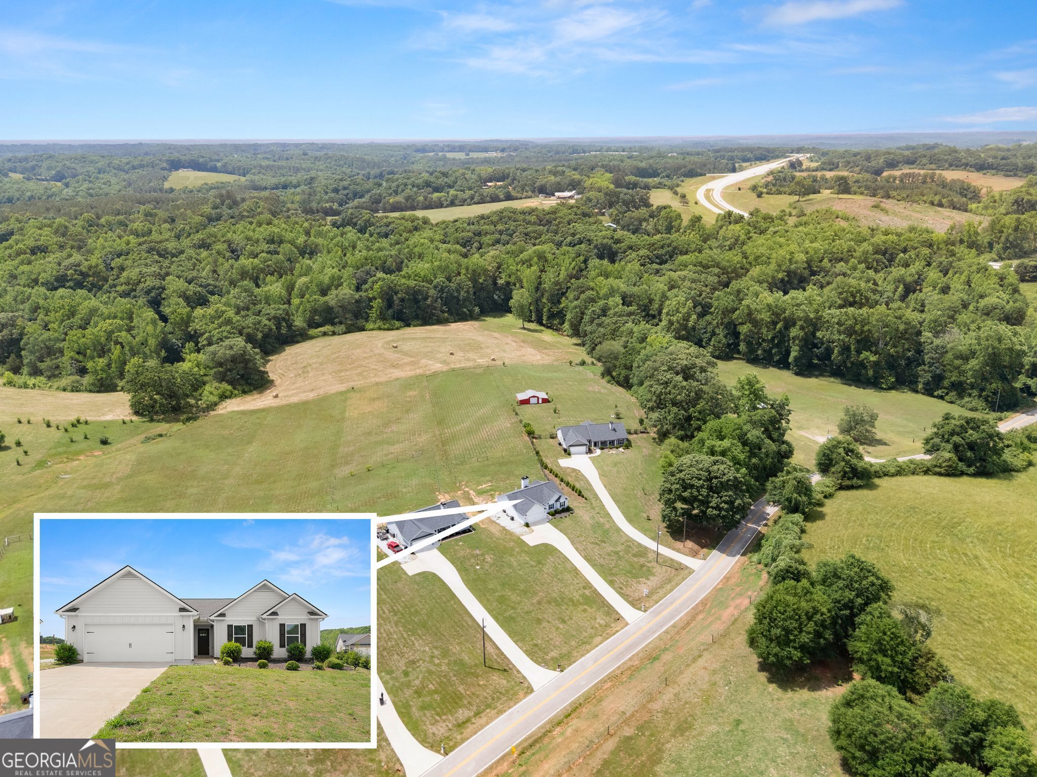 810 Anderson Thomas Road Martin, GA 30557 - Photo 38 of 40 an aerial view of a house with a garden and mountain view