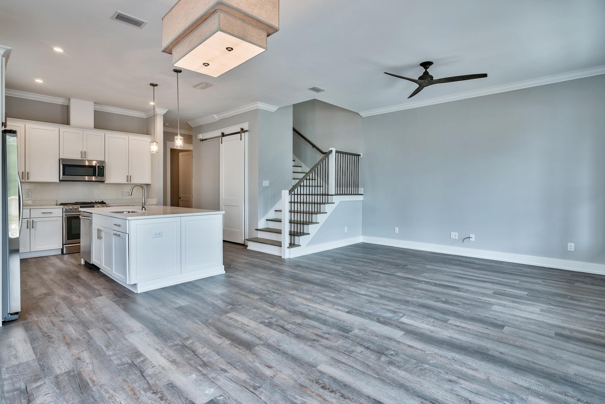Lot 29 West Willow Mist Rd Inlet Beach Inlet Beach, FL 32461 - Photo 1 of 28 a view of a kitchen with wooden floor and electronic appliances