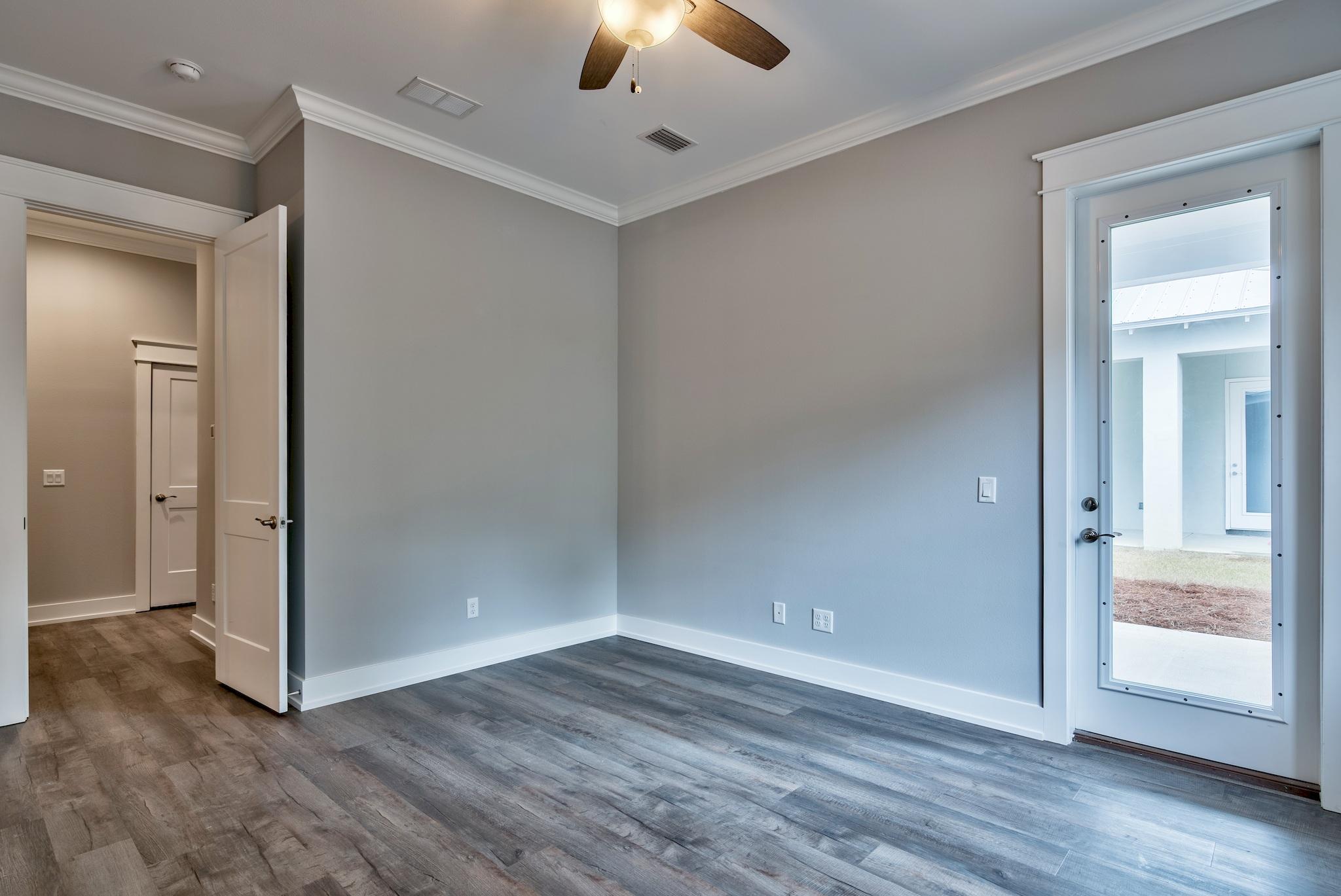 Lot 29 West Willow Mist Rd Inlet Beach Inlet Beach, FL 32461 - Photo 15 of 28 wooden floor in an empty room with a window
