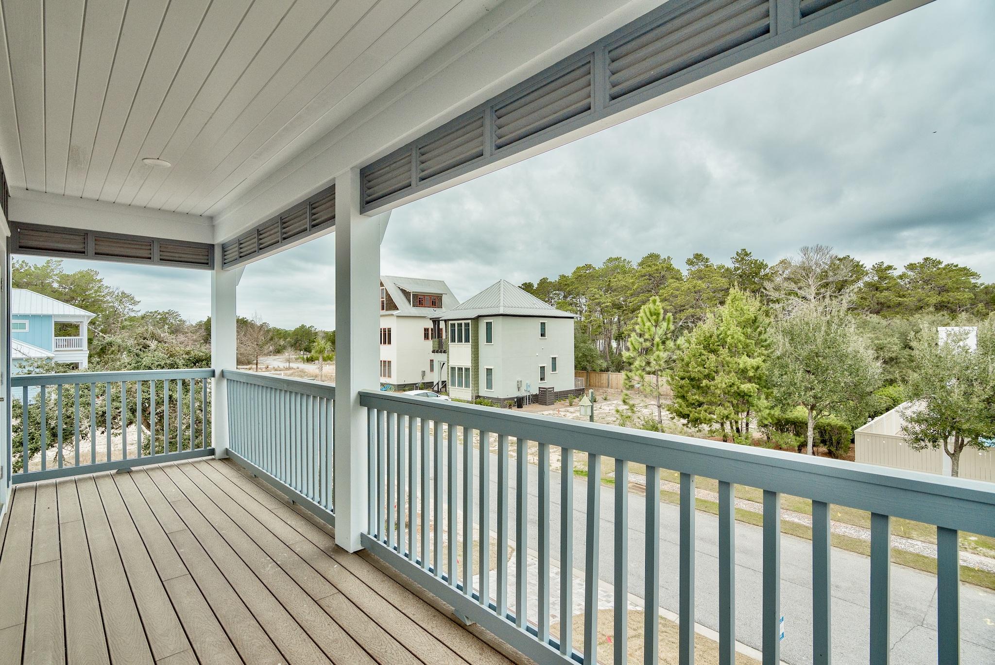 Lot 29 West Willow Mist Rd Inlet Beach Inlet Beach, FL 32461 - Photo 27 of 28 a view of a balcony with wooden floor
