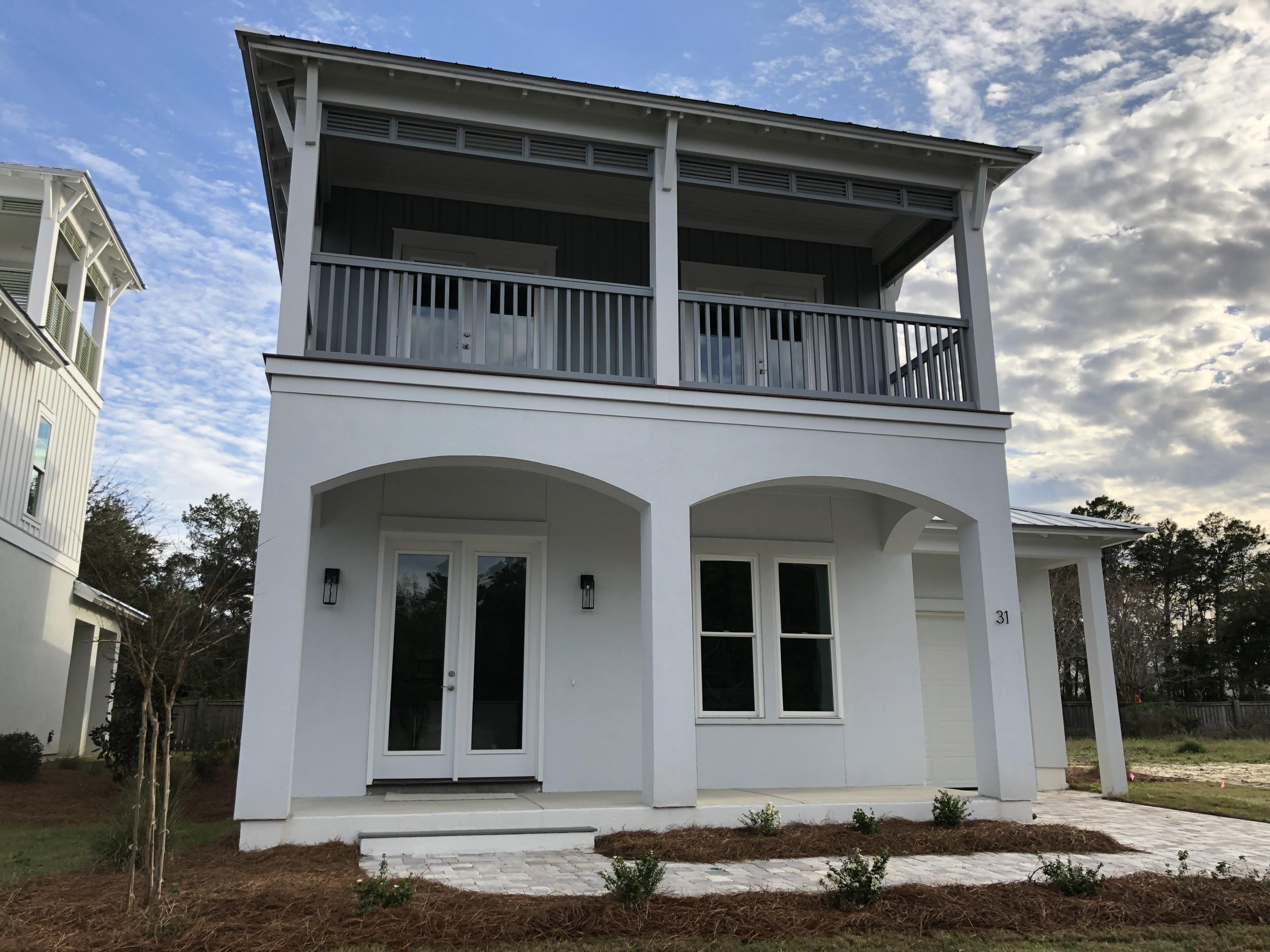 Lot 29 West Willow Mist Rd Inlet Beach Inlet Beach, FL 32461 - Photo 4 of 28 a front view of a house