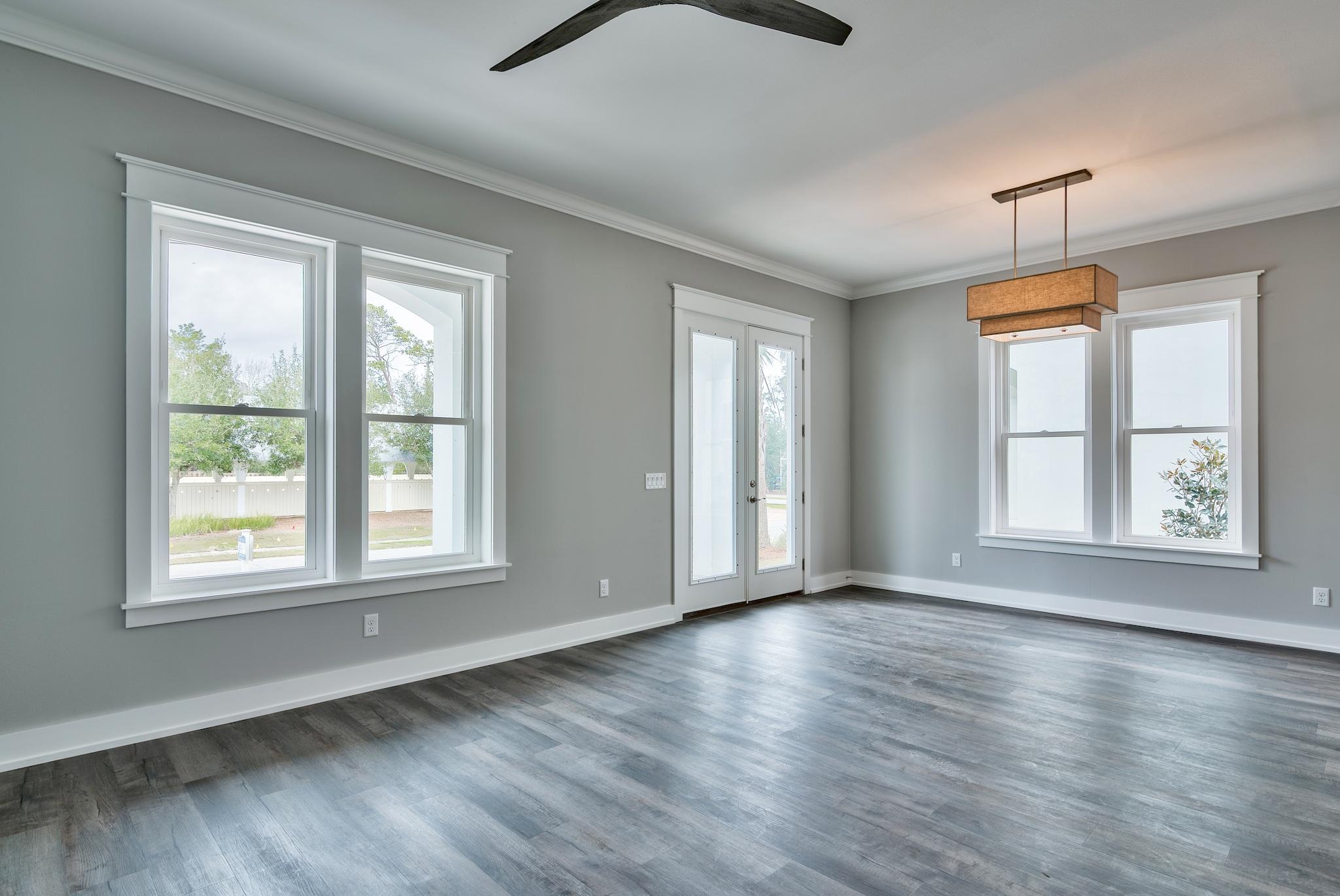 Lot 29 West Willow Mist Rd Inlet Beach Inlet Beach, FL 32461 - Photo 6 of 28 a view of an empty room with wooden floor and a window
