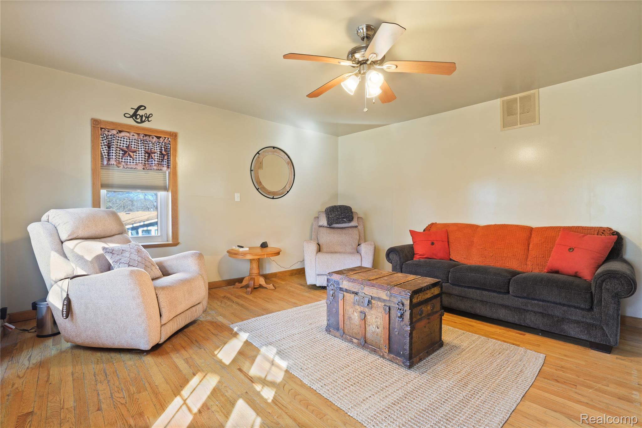 7149-7163 Burpee Road Grand Blanc, MI 48439 - Photo 61 of 72 Living area with light wood-type flooring and ceiling fan
