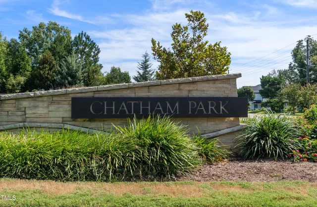 a view of a swimming pool and a yard