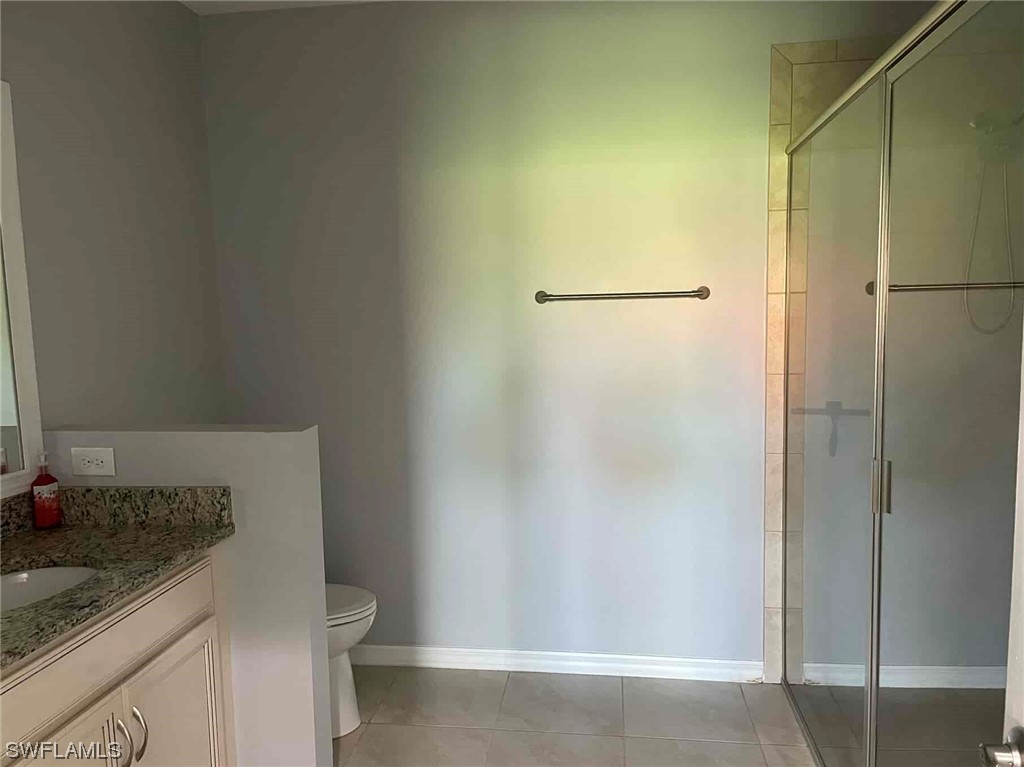 4369 Dutchess Park Road Fort Myers, FL 33916 - Photo 14 of 18 a bathroom with a granite countertop shower and a sink