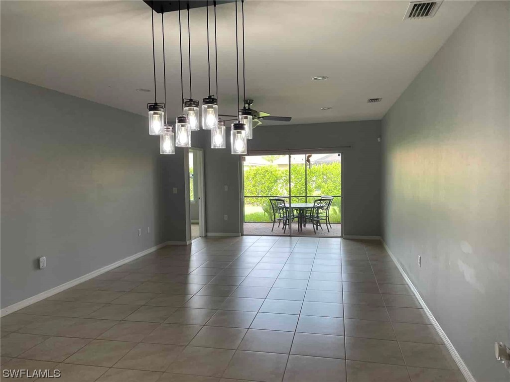 4369 Dutchess Park Road Fort Myers, FL 33916 - Photo 10 of 18 a view of a room with a chandelier