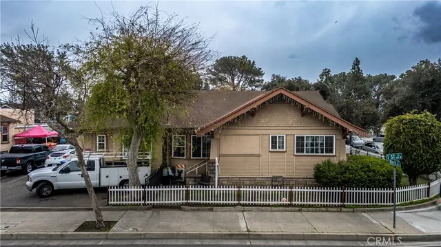 a view of multiple house with garage