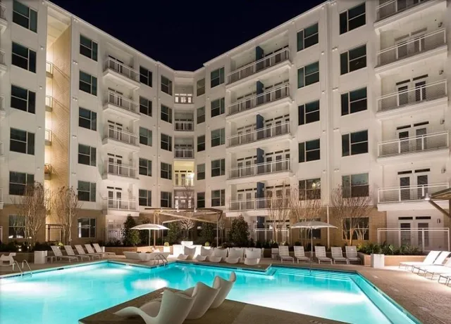 a view of a building with a yard