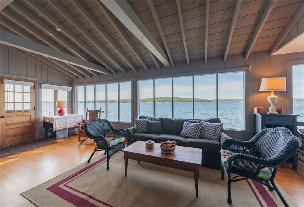 Open beamed living room with...