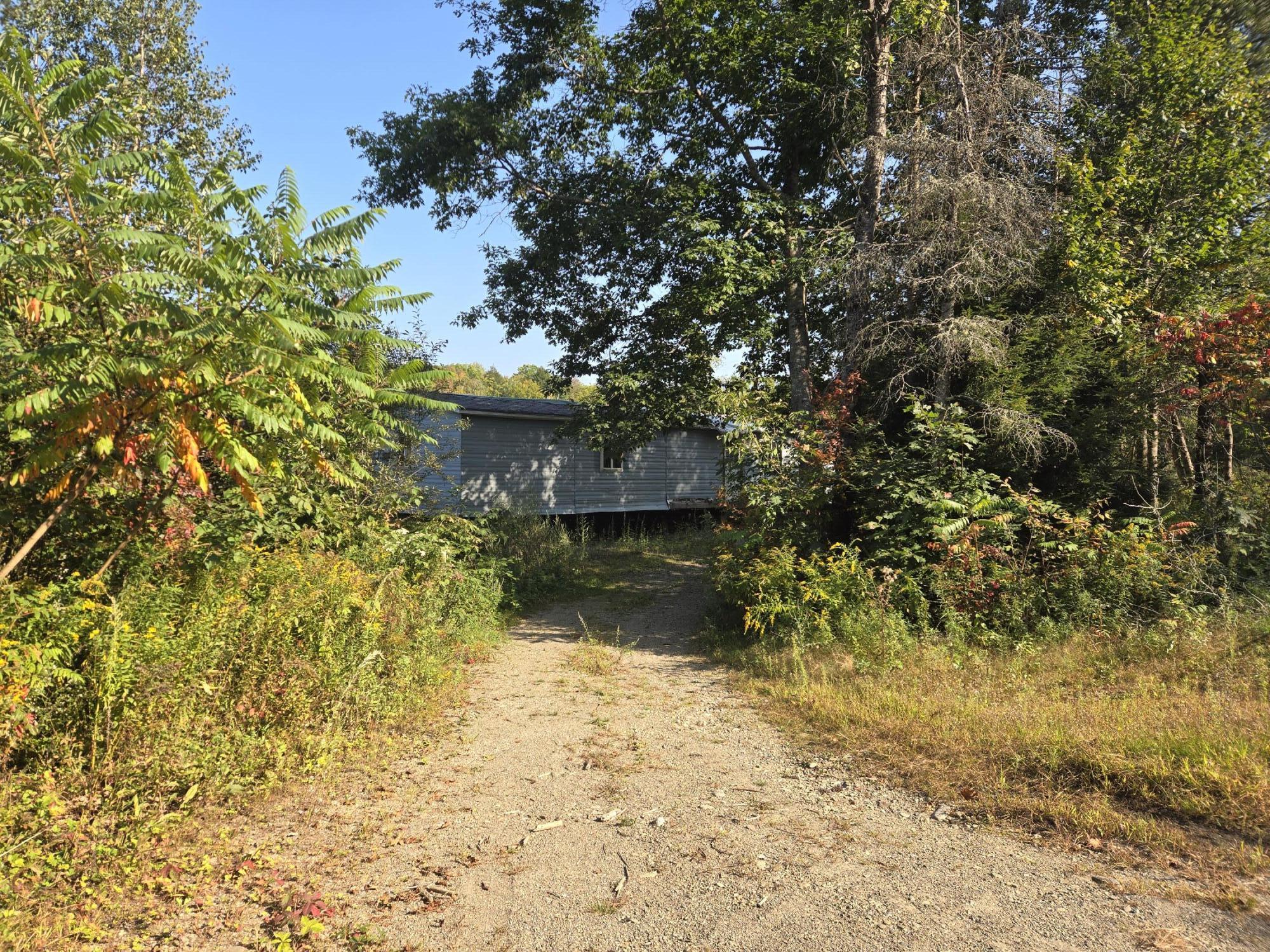 233 Valley Road Brooks, ME 04921 - Photo 2 of 6 Left Side of Horseshoe Driveway