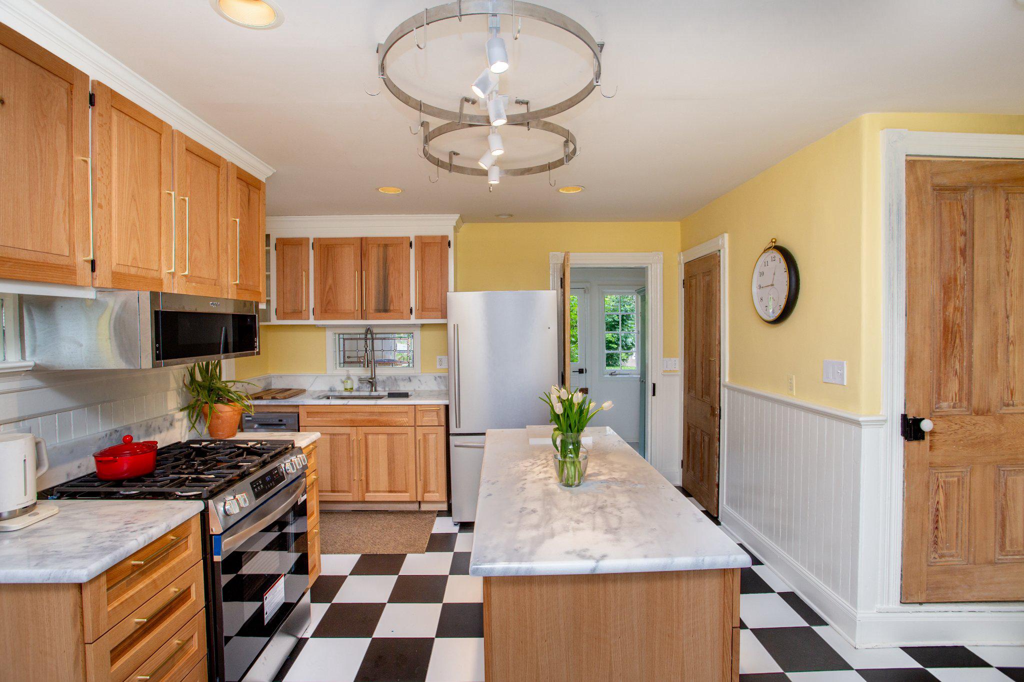 3 South Main Street Stockton, NJ 08559 - Photo 6 of 42 a kitchen with stainless steel appliances granite countertop a stove refrigerator sink and cabinets