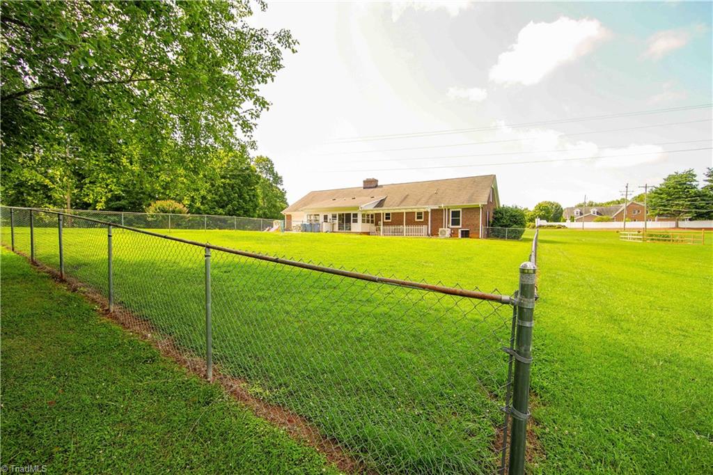 5376 Bunch Road Summerfield, NC 27358 - Photo 41 of 45 Fenced area comes in handy for furry friends!