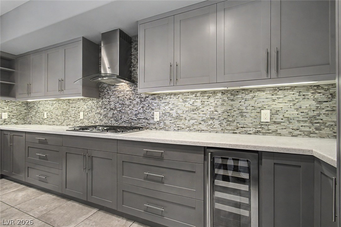 2555 Hampton Road, Unit 6308 Henderson, NV 89052 - Photo 16 of 30 Culinary delights await in this modern kitchen with ample counter space, custom backsplash and state-of-the-art appliances.