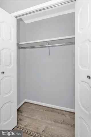 a view of an empty walk in closet