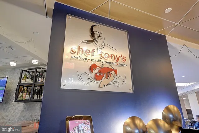 a view of a door and chair in a room