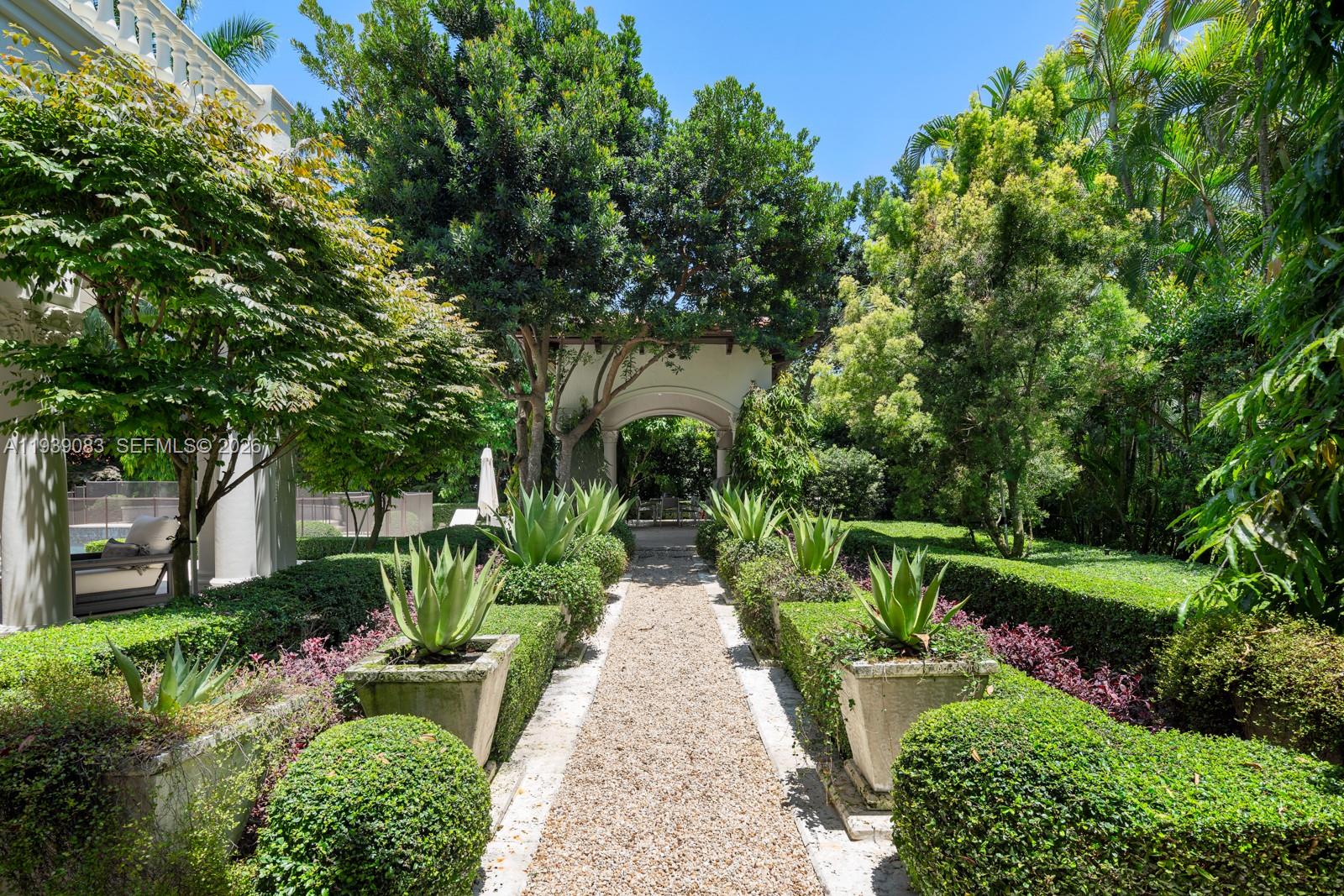 7275 Old Cutler Road Coral Gables, FL 33143 - Photo 1 of 1 a house view with a garden space